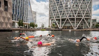 The open water swimming spot right under giant skyscrapers and next to a London Underground station