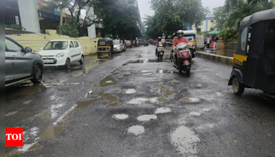 Potholed paths push Thane traffic onto highways | Thane News - Times of India