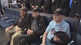 Bagpipes, flags welcome Chicago-area WWII veterans heading back to France for D-Day anniversary