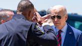 Biden, after meeting with families of officers killed in NC, says the nation is grieving with them