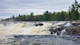 Two missing after canoes go over Minnesota waterfall as harsh weather hinders search