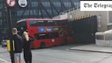 Double decker bus crashes into bridge near Paddington Station
