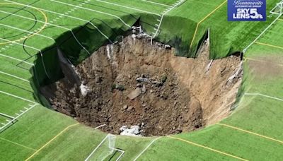 Football pitch swallowed up by 100ft-wide sinkhole