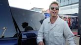Brad Pitt cheers fans at Silverstone paddock ahead of British Grand Prix