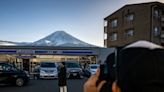 Japanese town to put barrier over shop to stop tourists taking photos of Mount Fuji