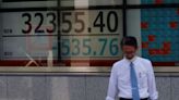Asia shares cautious as inflation dashes rate cut hopes
