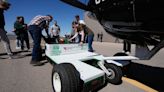 Utah students aim to tow planes to the gate with a battery-powered, fuel-saving vehicle