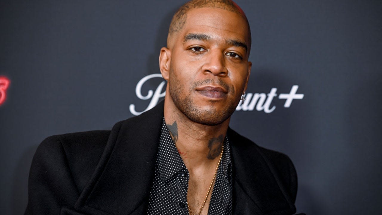 Kid Cudi Shows Walks With Surgical Boot, Crutches After Breaking Foot
