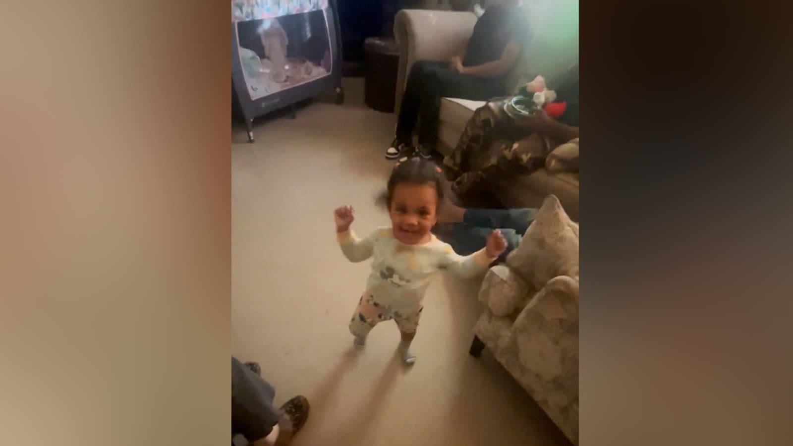 Toddler greets mom's best friend with an adorable happy dance