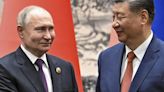 Leaders of Russia and China meet at a Central Asian summit in a show of deepening cooperation