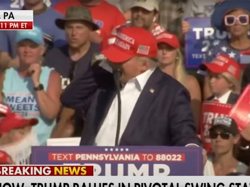 Photographer Captures Bullet Whizzing Past Trump's Head