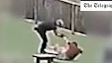 Moment teaching assistant attacks autistic boy in school playground