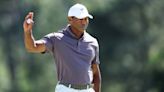 Tiger Woods makes Masters history but Scottie Scheffler stays on course at blustery Augusta
