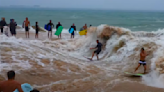 Watch: Surfers Ride Flash Flood River Wave in Hawaii