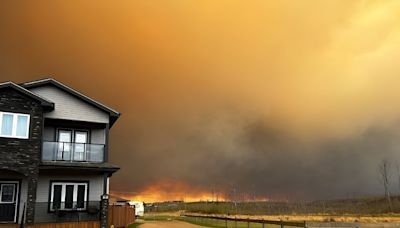 Wildfire closes in on Canadian oil sands city