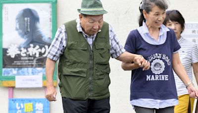 Japanese court acquits a former boxer in a 1966 murder retrial after decades on death row