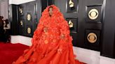 Lizzo channels ‘spring awakening’ in orange floral cape at 2023 Grammys