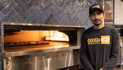 Wood-fired pizza prepared before your eyes at Saskatoon's DoughBox Pizza