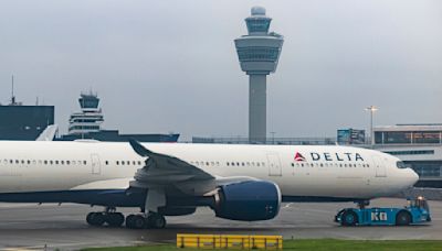 Delta Flight Makes Emergency Return After Slide Falls Off Plane