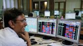 Sensex pares losses, ends 131 points higher