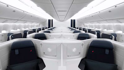I Flew in the World's Most Spacious Business-class Seat — Complete With Lie-flat Seats, Sliding Doors, and 17-inch Screens
