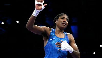 Refugee team boxer Ngamba one step from historic medal at Paris Olympics