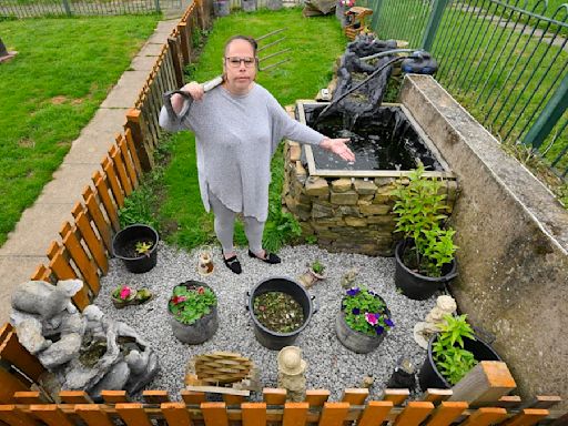 Furious woman slams landlord after she is ordered to remove fish pond