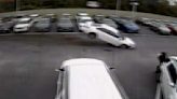 Out-of-control vehicle caught on camera flying into car dealership
