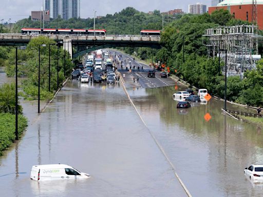 Storms flood the Ozarks and strand drivers in Toronto. A tornado moves a B-52 bomber in New York