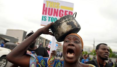 Security forces fire tear gas as anti-government protests break out across Nigeria