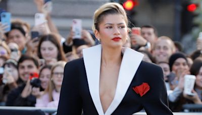 Zendaya Does Business, But Mostly Pleasure In A Bubble Skirt And Plunging Blazer