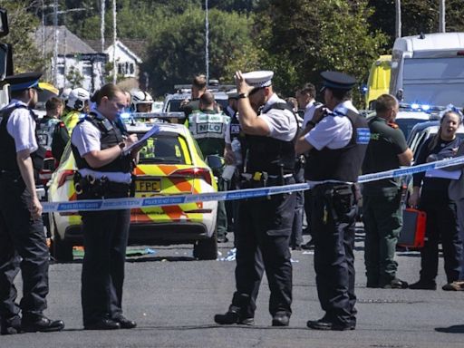 2 children dead and 11 people injured in stabbing rampage at a dance class in England, police say