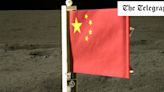 China unfurls flag on dark side of the Moon as probe heads back to Earth