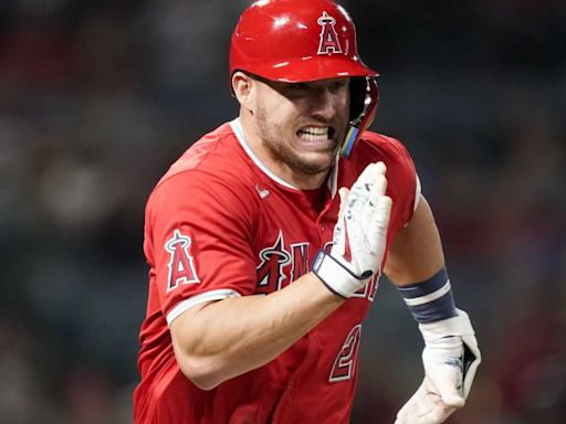 Angels star outfielder Mike Trout has knee surgery. Team expects 3-time MVP to return this season.