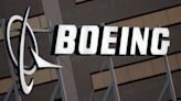 Boeing threatens to lock out its private firefighters around Seattle in a dispute over pay