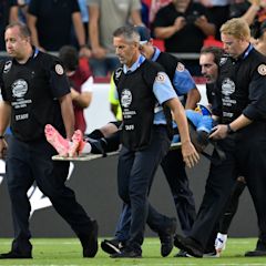 Uruguay player stretchered off after clashing heads with US defender during Copa America match