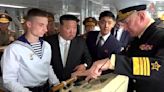 North Korea's Kim Jong Un inspects Russian bombers and a warship on a visit to Russia's Far East
