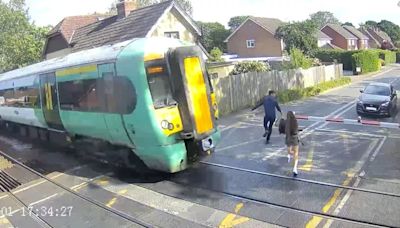 Shocking CCTV shows people risking lives at train level crossings