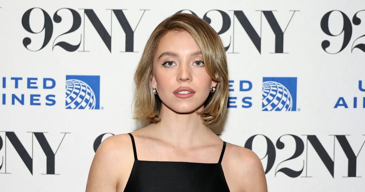 Sydney Sweeney Matches the 'It' Bag of the Summer With a White Sun Dress