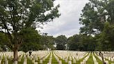 Soldiers place flags at Arlington National Cemetery for Memorial Day