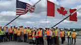 Politicians come together to celebrate Gordie Howe International Bridge deck connection