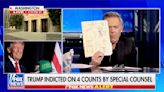 Fox News’ Greg Gutfeld Doodles While Co-Hosts Announce Trump Indictment