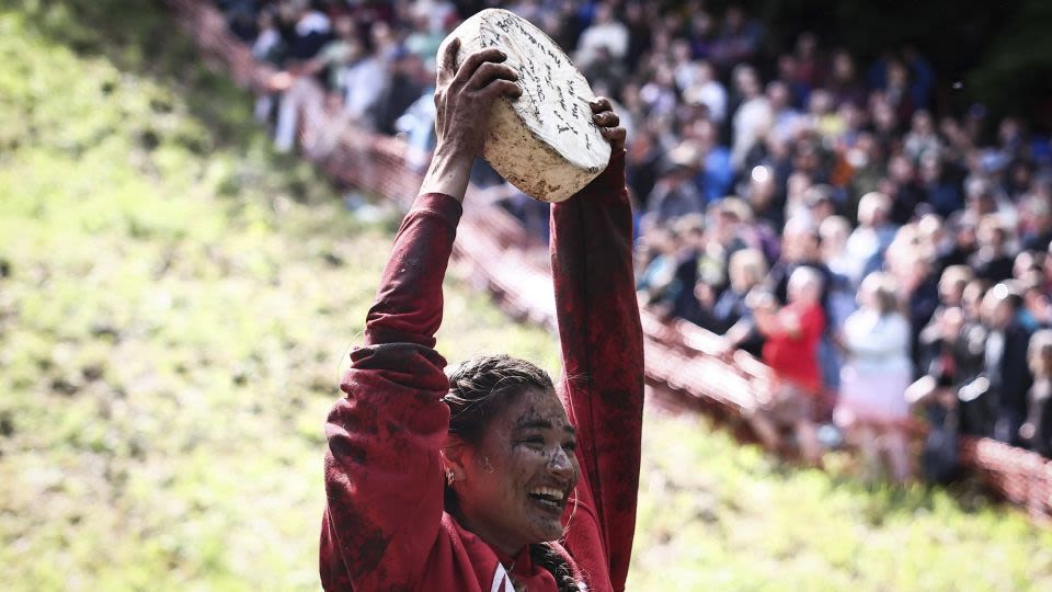 ‘My face took a lot of hits down the hill’: American Abby Lampe explains how to win renowned cheese-rolling competition