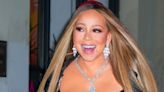 Watch Mariah Carey Avoid A 'Dress Malfunction' By Breaking Into Song