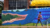 A nearly 40-year-old gator tale of a mural gets an update in Baltimore