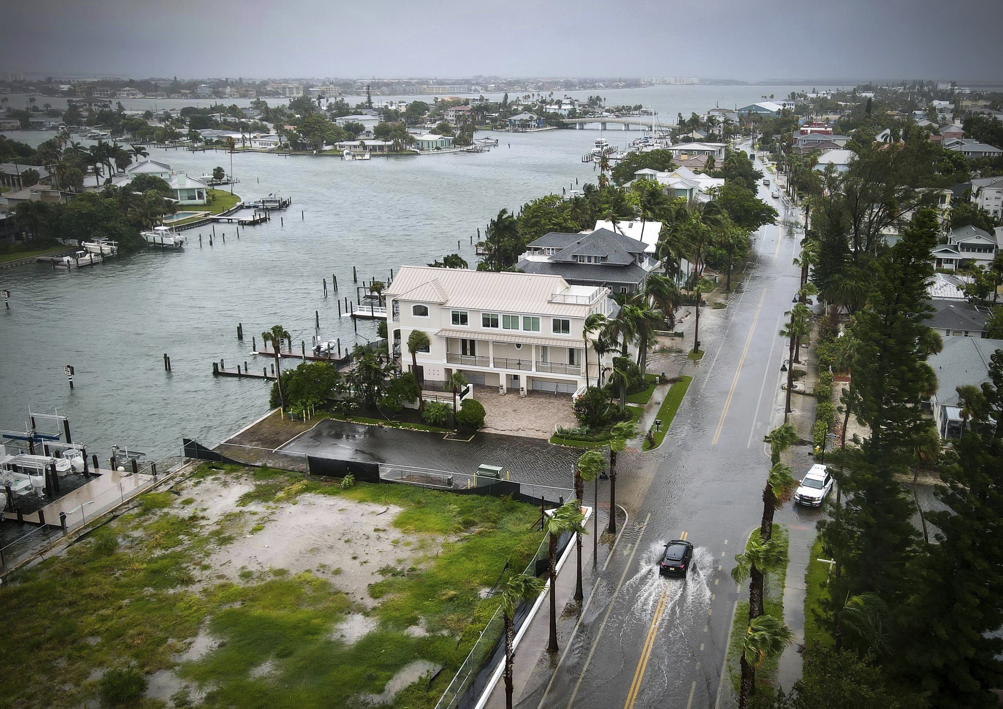 Slow-moving Tropical Storm Debby brings torrential rains and flooding to Southeast