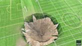 Videos capture giant sinkhole opening up in middle of Illinois soccer field