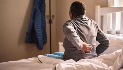 Struggling to Sleep With Low Back Pain? These Expert Tips May Help