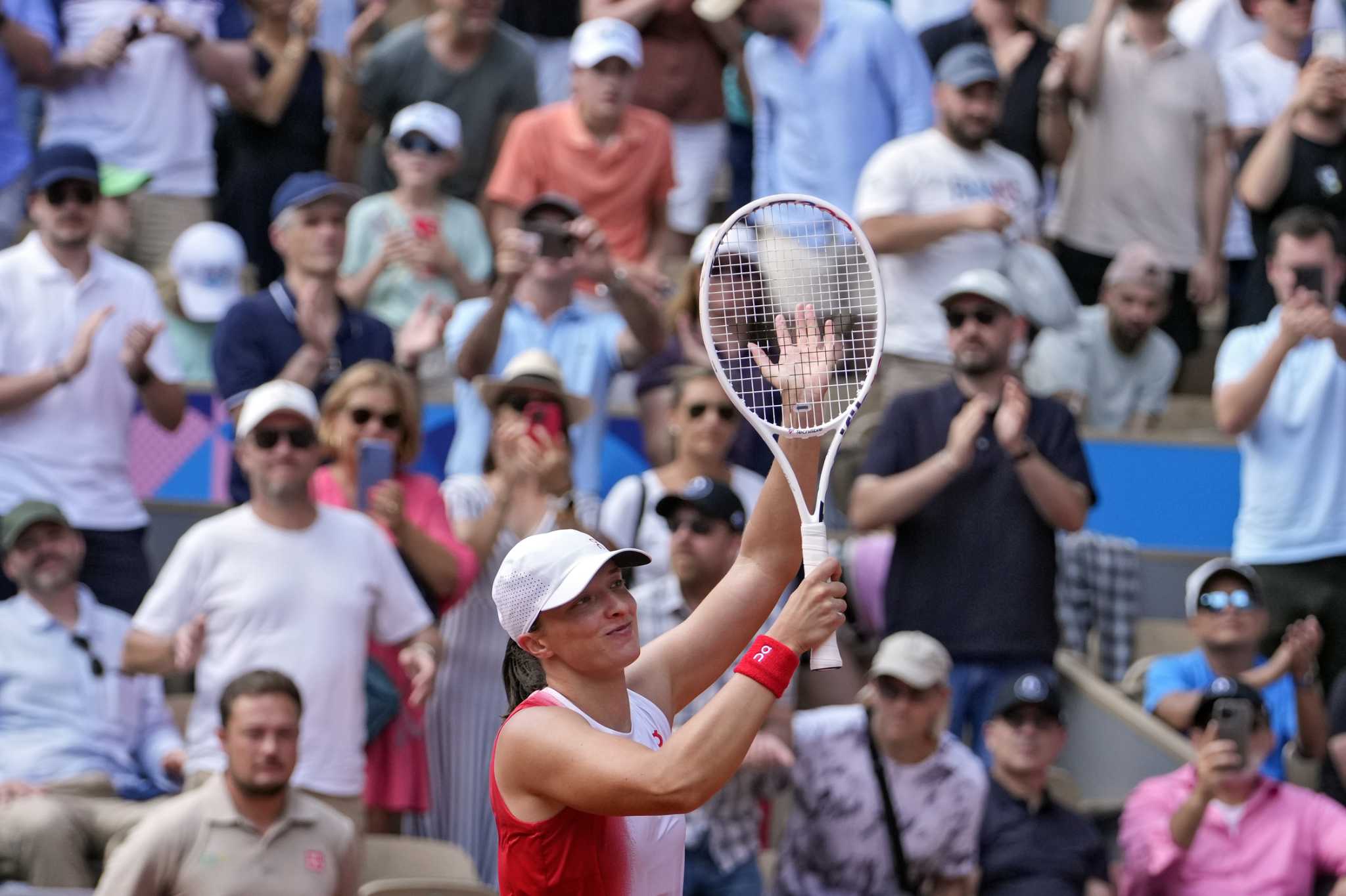 Iga Swiatek wins a bronze at the 2024 Olympics for Poland's first tennis medal at any Summer Games