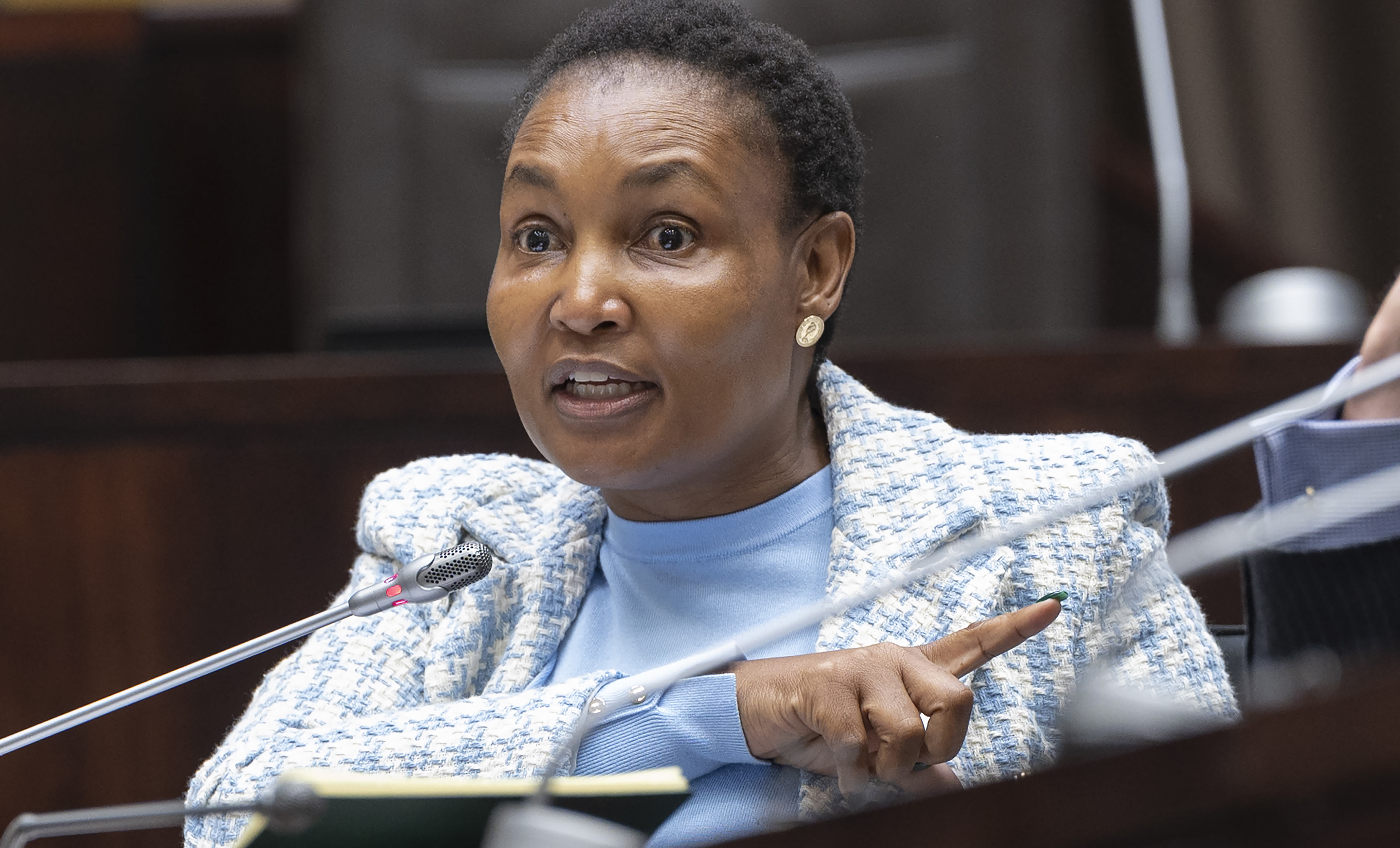 South Africa's justice minister denies corruption allegations against her in a mutual bank scandal